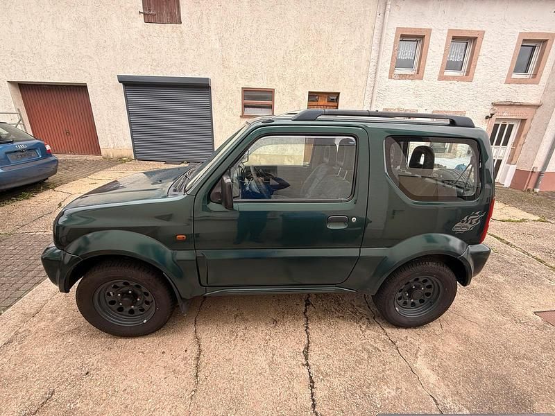 Grün Gebraucht 2005 Suzuki Jimny SUV | 6.090 € (Guter Preis) - Bild 1/4