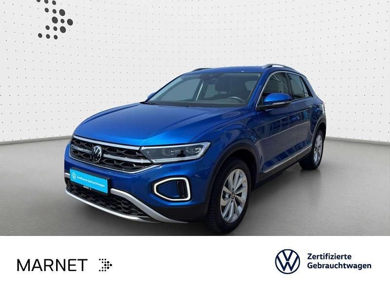 Ravennablau metallic Gebraucht 2024 VW T-Roc Style SUV | 31.190 € (Fairer Preis) - Bild 1/3