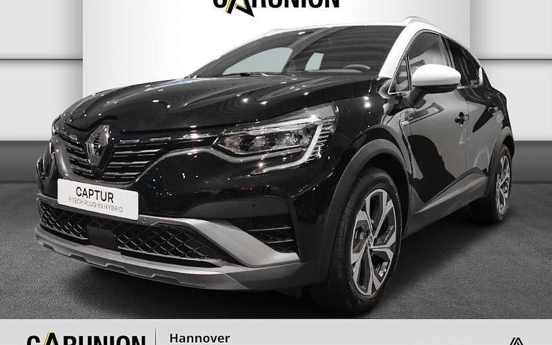 Black pearlschwarz metallic, alabasterweiß metal (schwarz) Gebraucht 2021 Renault Captur R.S. SUV | 21.375 € (Fairer Preis) - Bild 1/4