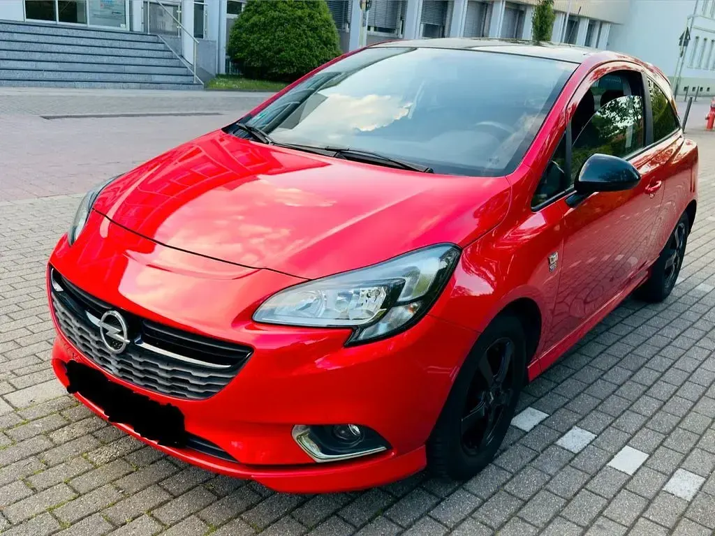 Usado Opel Corsa Color Edition 101 HP (74 kW) 2015 Vermelho Citadino