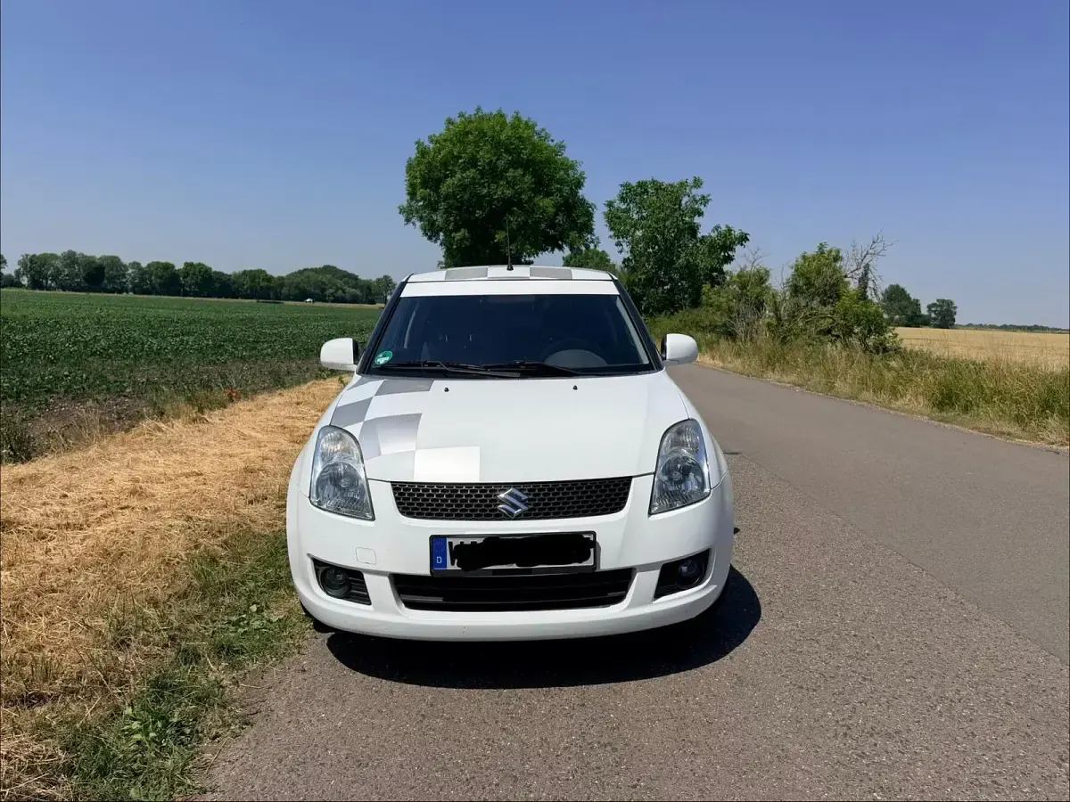 Gebraucht Suzuki Swift 92 PS (67 kW) 2009 Weiß Kleinwagen