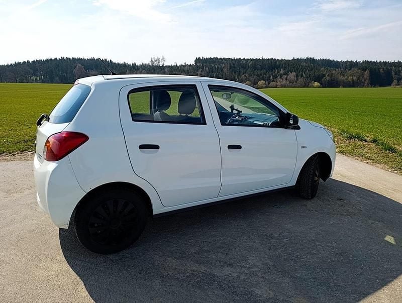 Second-hand Mitsubishi Space Star 70 CP (51 kW) 2015 Alb Hatchback