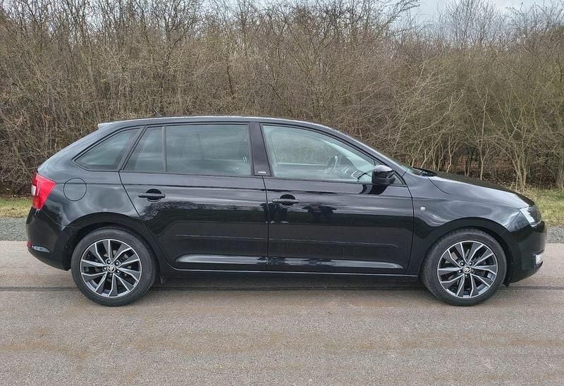 Second-hand Skoda Rapid 105 CP (77 kW) 2015 Negru Hatchback