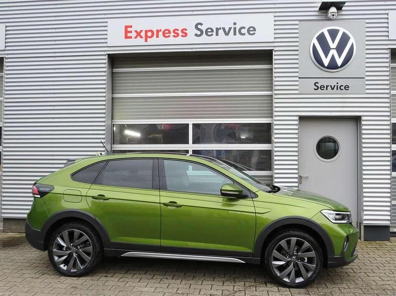 Visual green metallic Gebraucht 2023 VW Taigo Style SUV | 22.990 € (Etwas zu teuer) - Bild 1/4