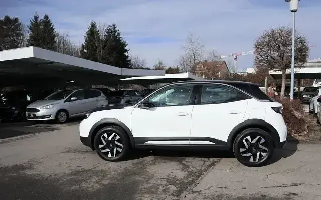 Gebraucht Opel Mokka-e Elegance 100 kW (136 PS) 2023 Arktis weiß SUV