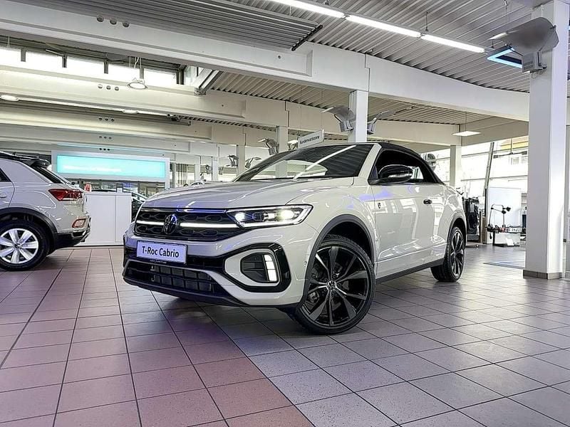 Ascotgrau schwarz Gebraucht 2025 VW T-Roc Cabriolet R-line Cabrio | 44.980 € - Bild 1/4