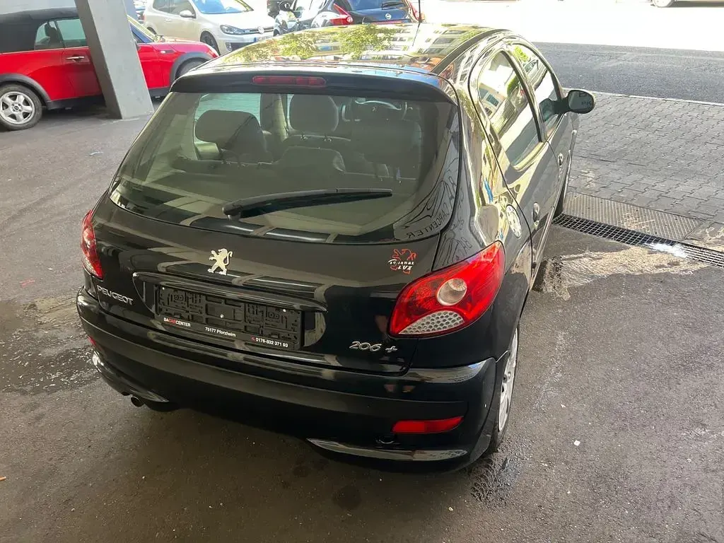 Gebraucht Peugeot 206 73 PS (53 kW) 2012 Schwarz Limousine