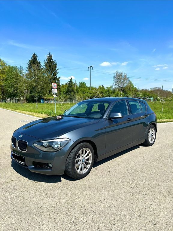 Schwarz Gebraucht 2014 BMW 116 Efficient Dynamics Kleinwagen | 7.000 € - Bild 1/4