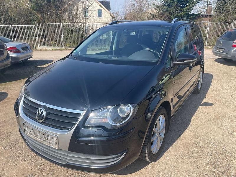 Gebraucht VW Touran Freestyle 105 PS (77 kW) 2010 Schwarz Van / Kleinbus