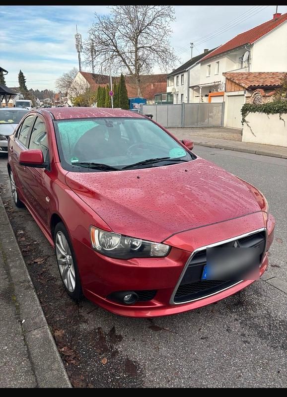 Rot Gebraucht 2009 Mitsubishi Lancer Limousine | 2.900 € - Bild 1/4