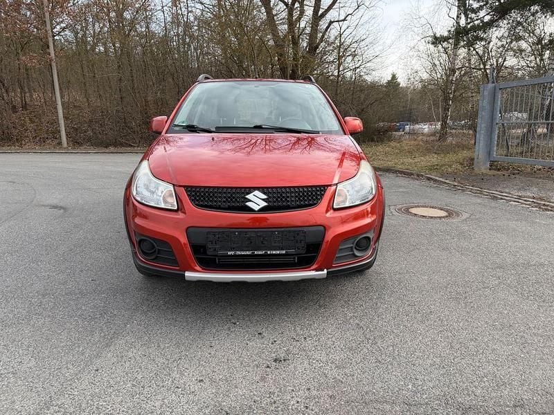 Gebraucht Suzuki SX4 Club 135 PS (99 kW) 2011 Orange SUV