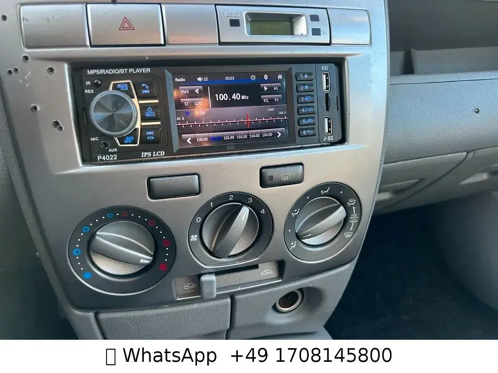 Używany Mazda 2 Comfort 75 KM (55 kW) 2004 Czerwony Hatchback