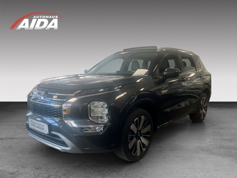 Grau Neu 2025 Mitsubishi Outlander P-HEV Top SUV | 57.990 € - Bild 1/4