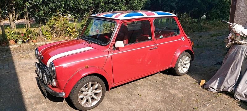 Second-hand Rover Mini 63 CP (46 kW) 1998 Roșu Hatchback