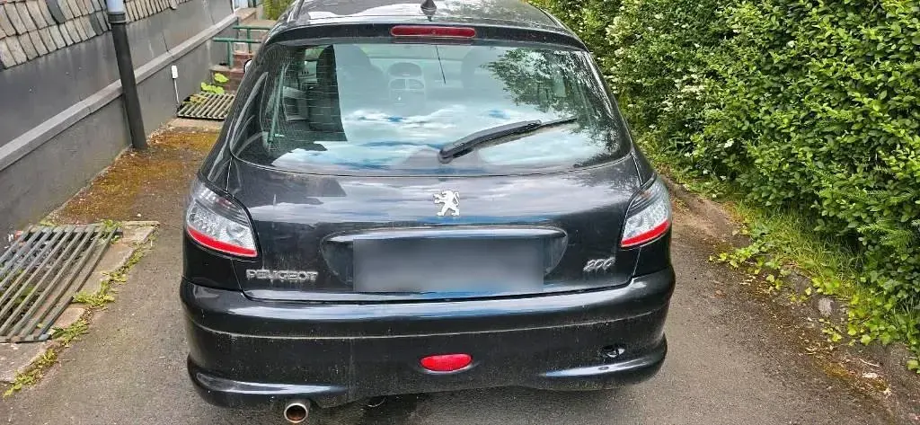 Gebraucht Peugeot 206 60 PS (44 kW) 2006 Schwarz Kleinwagen