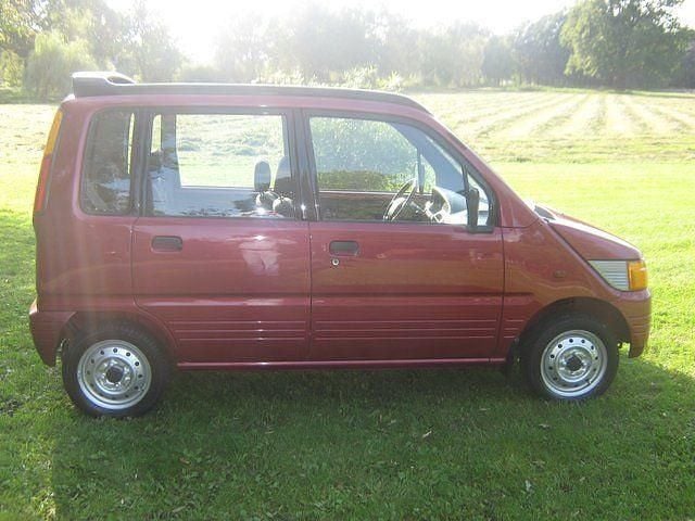 Gebraucht Daihatsu Move 56 PS (41 kW) 1998 Rot metallic Van / Kleinbus