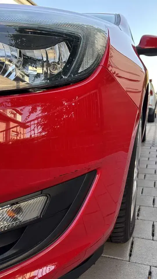 Gebraucht Opel Astra Edition 120 PS (88 kW) 2015 Rot Kleinwagen