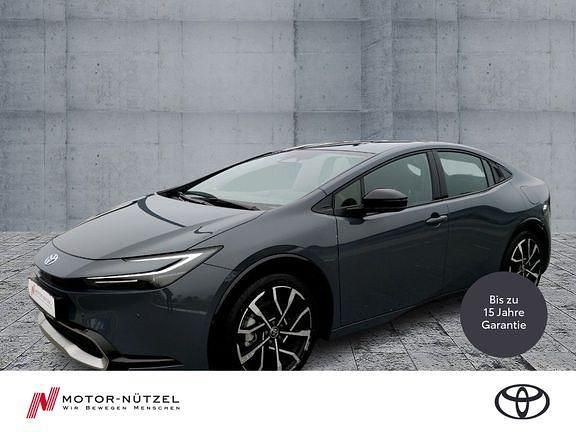 Ash metallic Gebraucht 2023 Toyota Prius Executive Kleinwagen | 33.950 € (Fairer Preis) - Bild 1/4