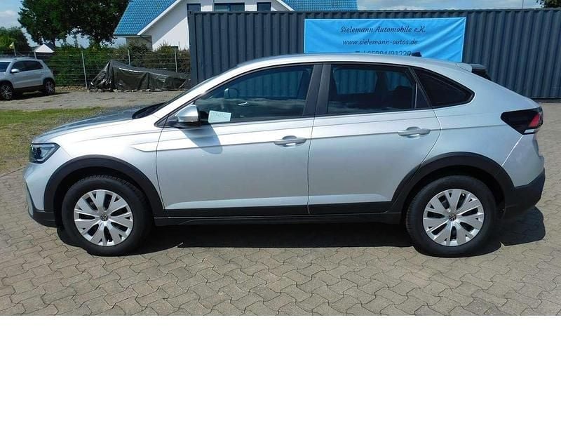 Reflexsilbermet a7wsilber Gebraucht 2024 VW Taigo Basis SUV | 17.390 € (Superpreis) - Bild 1/4