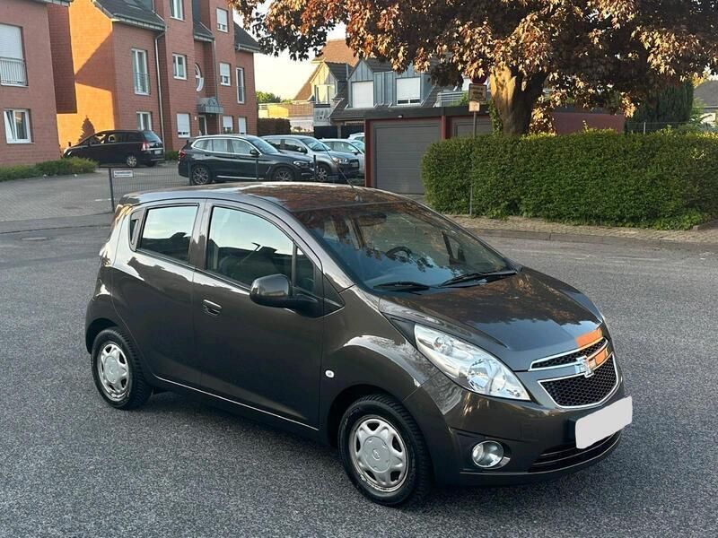 Braun Gebraucht 2012 Chevrolet Spark Kleinwagen | 2.900 € (Fairer Preis) - Bild 1/4