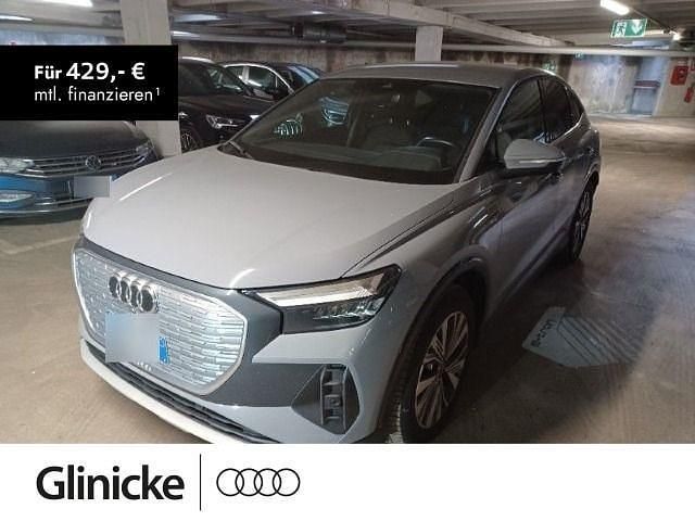 Grau Gebraucht 2023 Audi Q4 Sportback e-tron Advanced SUV | 32.980 € (Guter Preis) - Bild 1/3