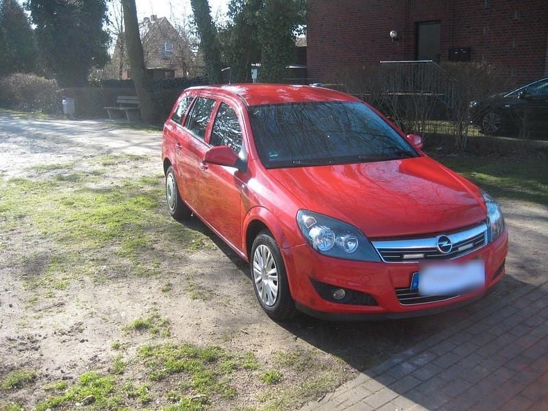 Second-hand Opel Astra 116 CP (85 kW) 2012 Roșu Break