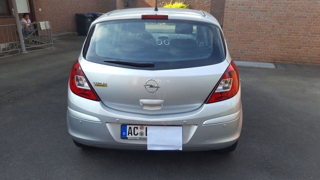 Używany Opel Corsa 118 KM (86 kW) 2010 Srebrny Hatchback