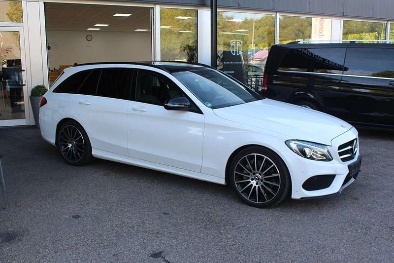 Polarweiss Gebraucht 2017 Mercedes C250 AMG line Plus Kombi | 27.950 € (Teuer) - Bild 1/4