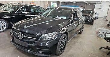 Schwarz Gebraucht 2021 Mercedes C300e AMG line Limousine | 29.499 € (Fairer Preis) - Bild 1/4