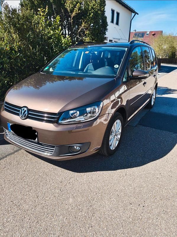 Gebraucht VW Touran 105 PS (77 kW) 2011 Braun Van / Kleinbus