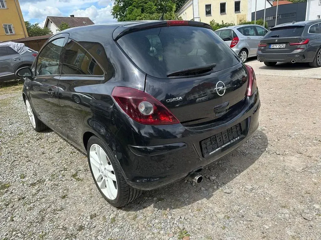 Używany Opel Corsa 87 KM (63 kW) 2011 Czarny Hatchback