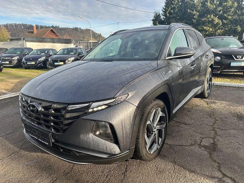 Grau Gebraucht 2021 Hyundai Tucson SUV | 22.900 € (Fairer Preis) - Bild 1/4