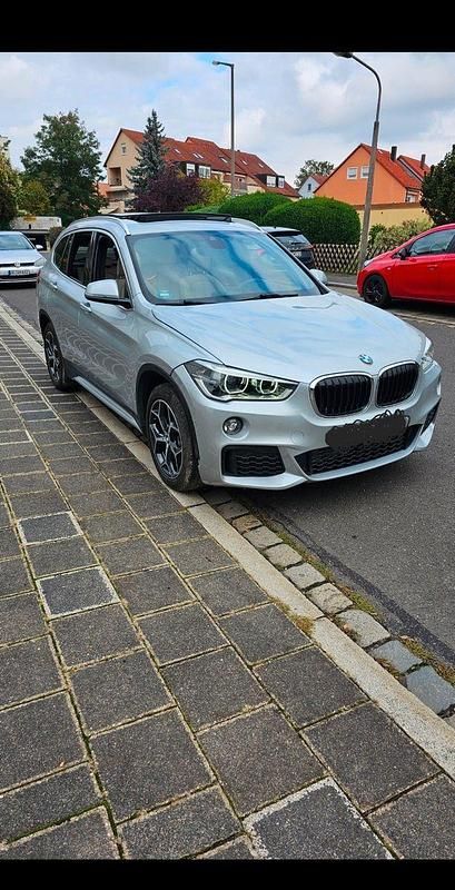 Silber Gebraucht 2018 BMW X1 Sport Line SUV | 17.400 € (Superpreis) - Bild 1/2