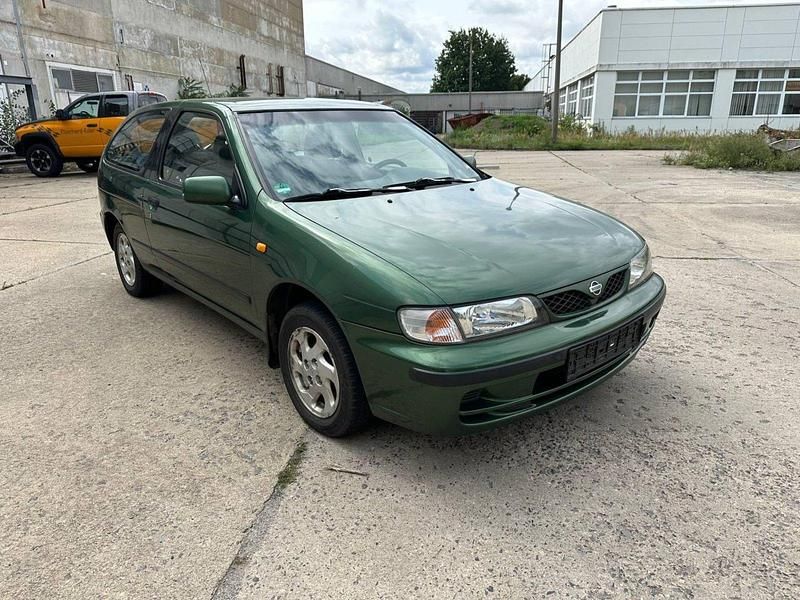 Grün Gebraucht 1999 Nissan Almera Kleinwagen | 699 € - Bild 1/4