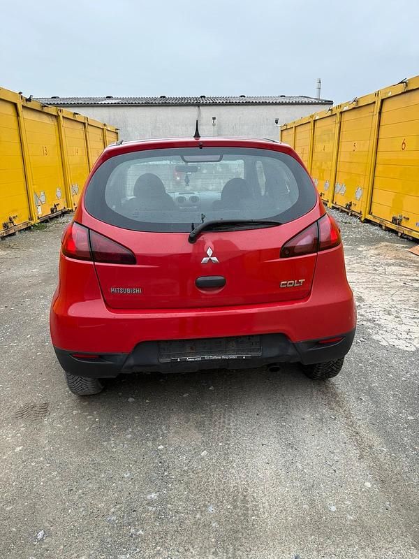 Gebraucht Mitsubishi Colt 75 PS (55 kW) 2009 Rot Kleinwagen