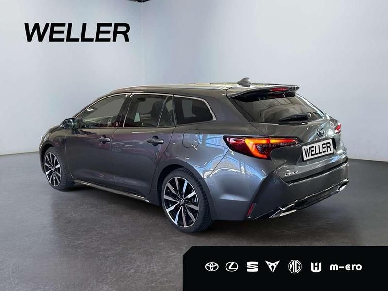 Neu Toyota Corolla Hybrid 196 PS (144 kW) 2026 Grau Kombi