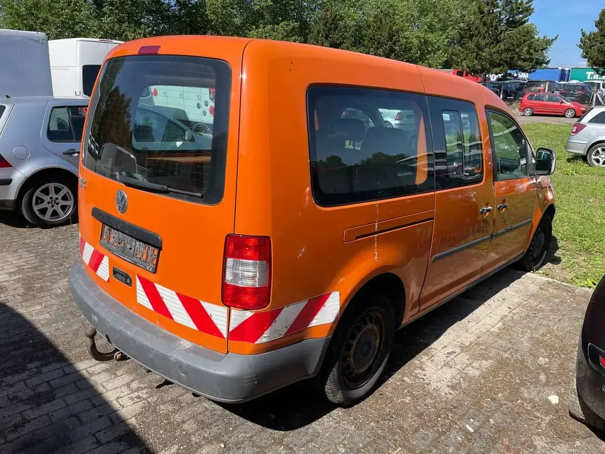 Gebraucht VW Caddy 105 PS (77 kW) 2009 Leuchtorange Van / Kleinbus