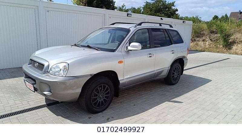 Grau Gebraucht 2004 Hyundai Santa Fe Edition+ SUV | 1.290 € (Superpreis) - Bild 1/4