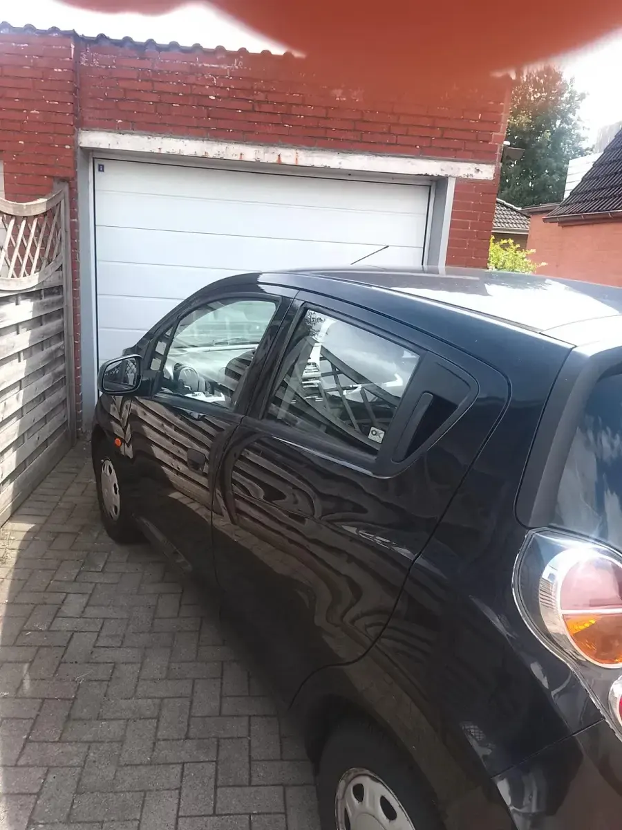 Gebraucht Chevrolet Spark 68 PS (50 kW) 2010 Schwarz Kleinwagen
