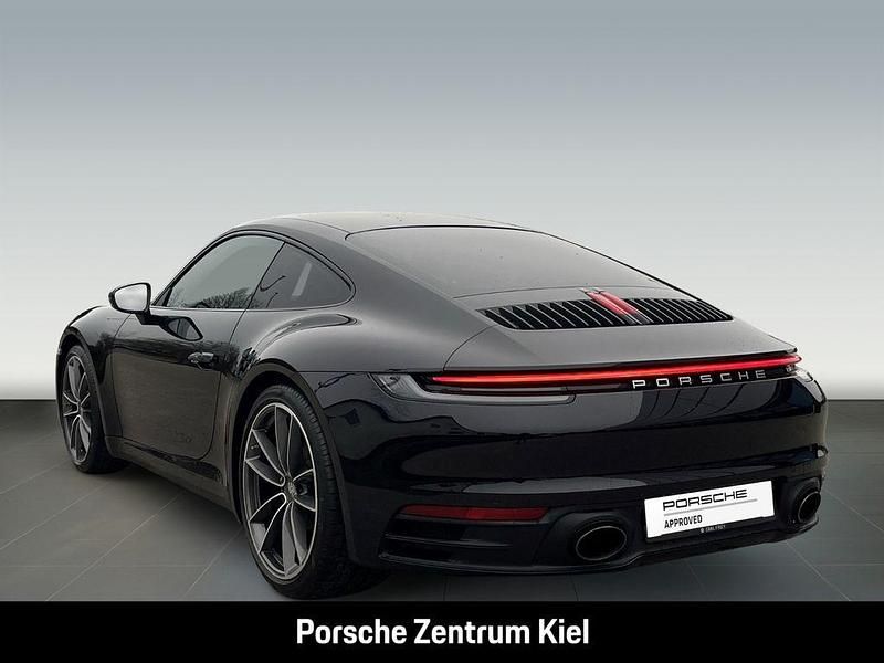 Gebraucht Porsche 911 Carrera 385 PS (283 kW) 2021 Tiefschwarzmetallic Coupé