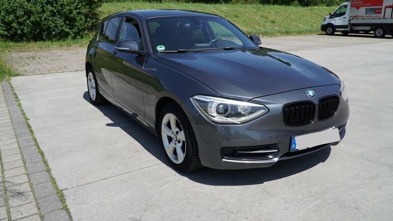 Grau Gebraucht 2012 BMW 116 Sport Line Kleinwagen | 3.950 € - Bild 1/4