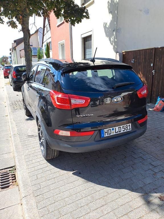 Schwarz Gebraucht 2012 Kia Sportage Vision SUV | 11.000 € (Fairer Preis) - Bild 1/4