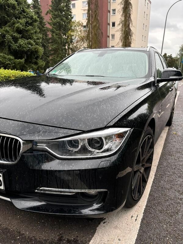 Schwarz Gebraucht 2013 BMW 318 Luxury Line Kombi | 11.500 € - Bild 1/4