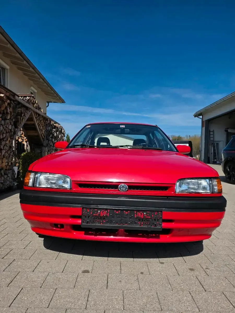 Gebraucht Mazda 323 88 PS (64 kW) 1992 Rot Kleinwagen