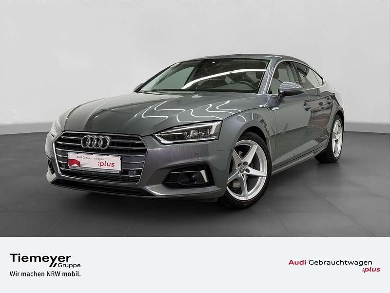 Monsungrau metallic Gebraucht 2020 Audi A5 Sport Coupé | 26.960 € (Superpreis) - Bild 1/4