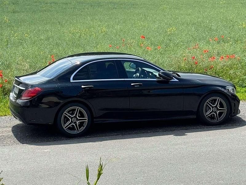 Schwarz Gebraucht 2019 Mercedes C220 AMG line Limousine | 19.500 € - Bild 1/4
