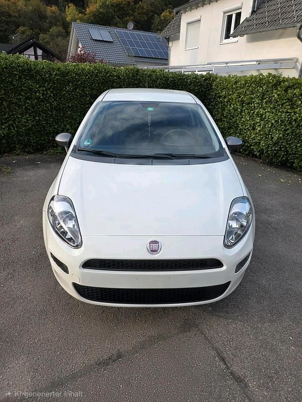 Weiß Gebraucht 2014 Fiat Punto Kleinwagen | 2.999 € (Guter Preis) - Bild 1/4