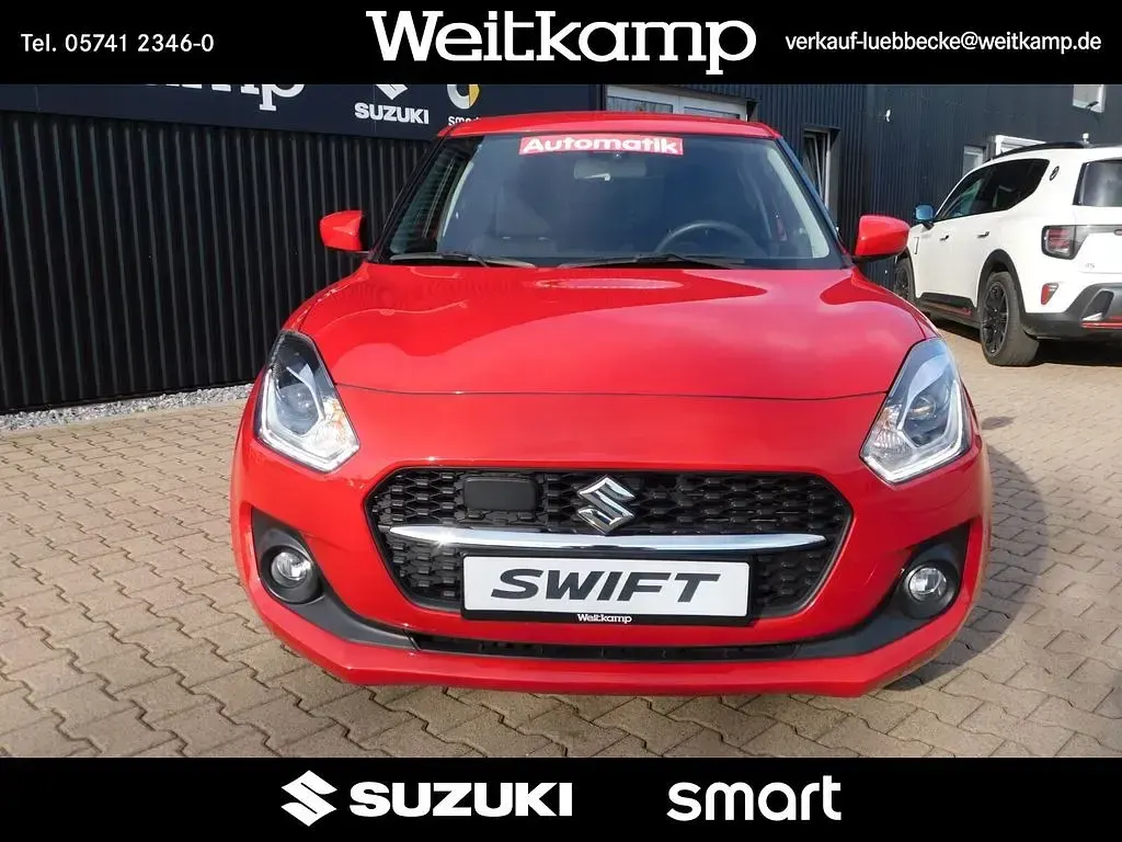 Gebraucht Suzuki Swift Comfort 83 PS (61 kW) 2023 Solid fervent red (znb) Kleinwagen