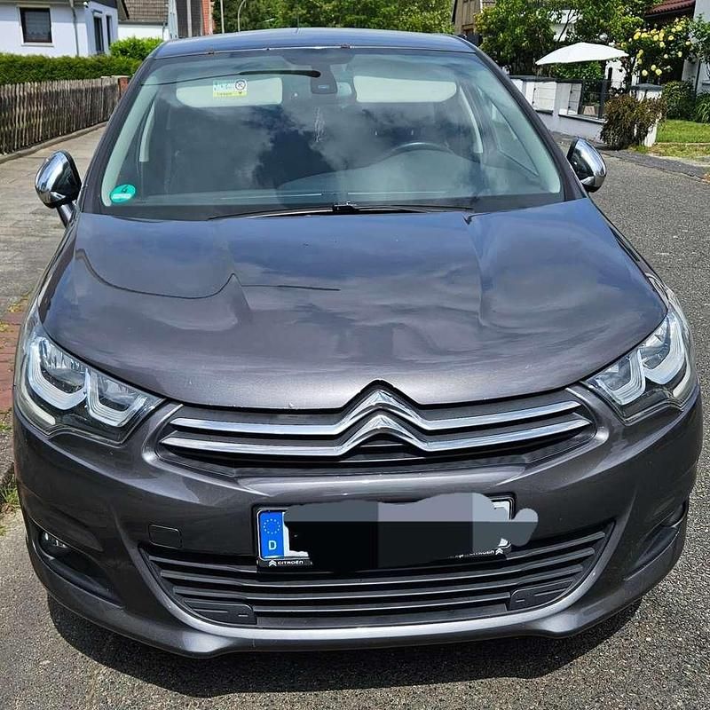 Grau Gebraucht 2015 Citroën C4 PureTech Limousine | 5.999 € (Etwas zu teuer) - Bild 1/4