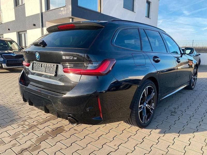 Gebraucht BMW 320e M Sport 204 PS (150 kW) 2024 Schwarz Kombi